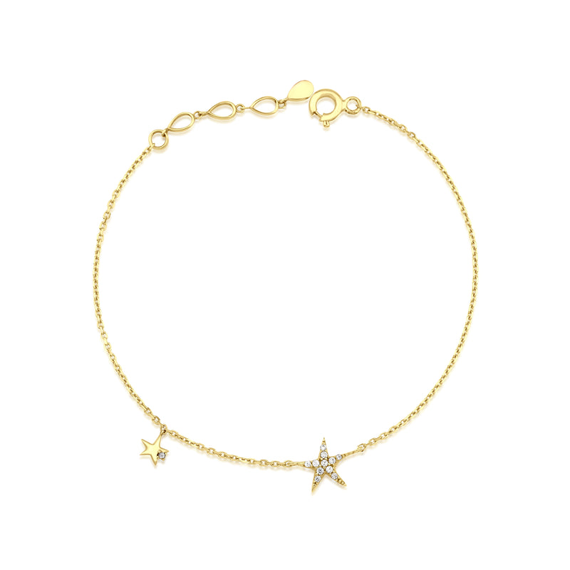 twin star bracelet in yellow gold on white background