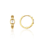 yellow gold chain-link huggie hoop earrings with baguette stone on white background