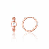 rose gold chain-link huggie hoop earrings with baguette stone on white background