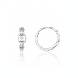 white gold chain-link huggie hoop earrings with baguette stone on white background