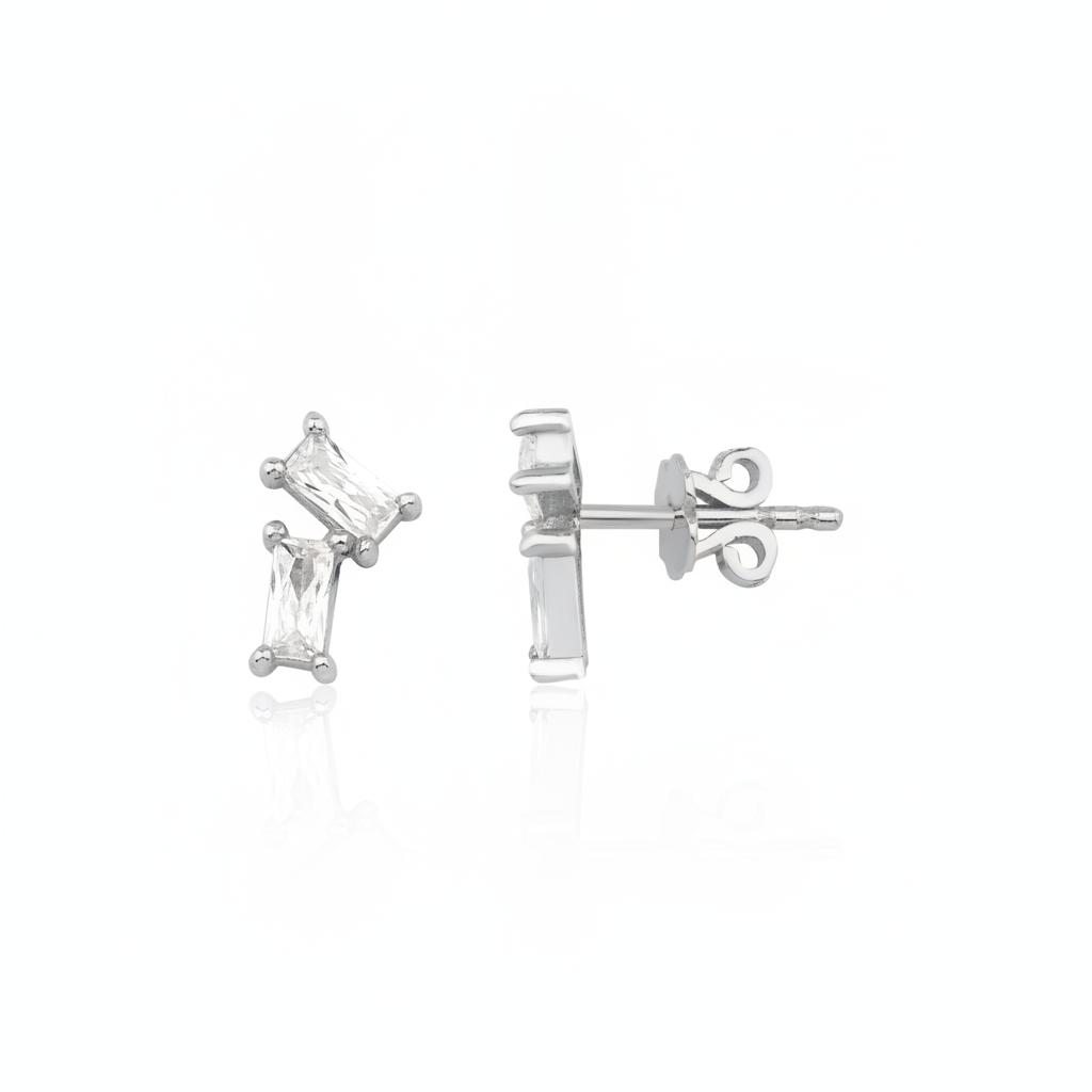 white gold baguette stud earrings on white background