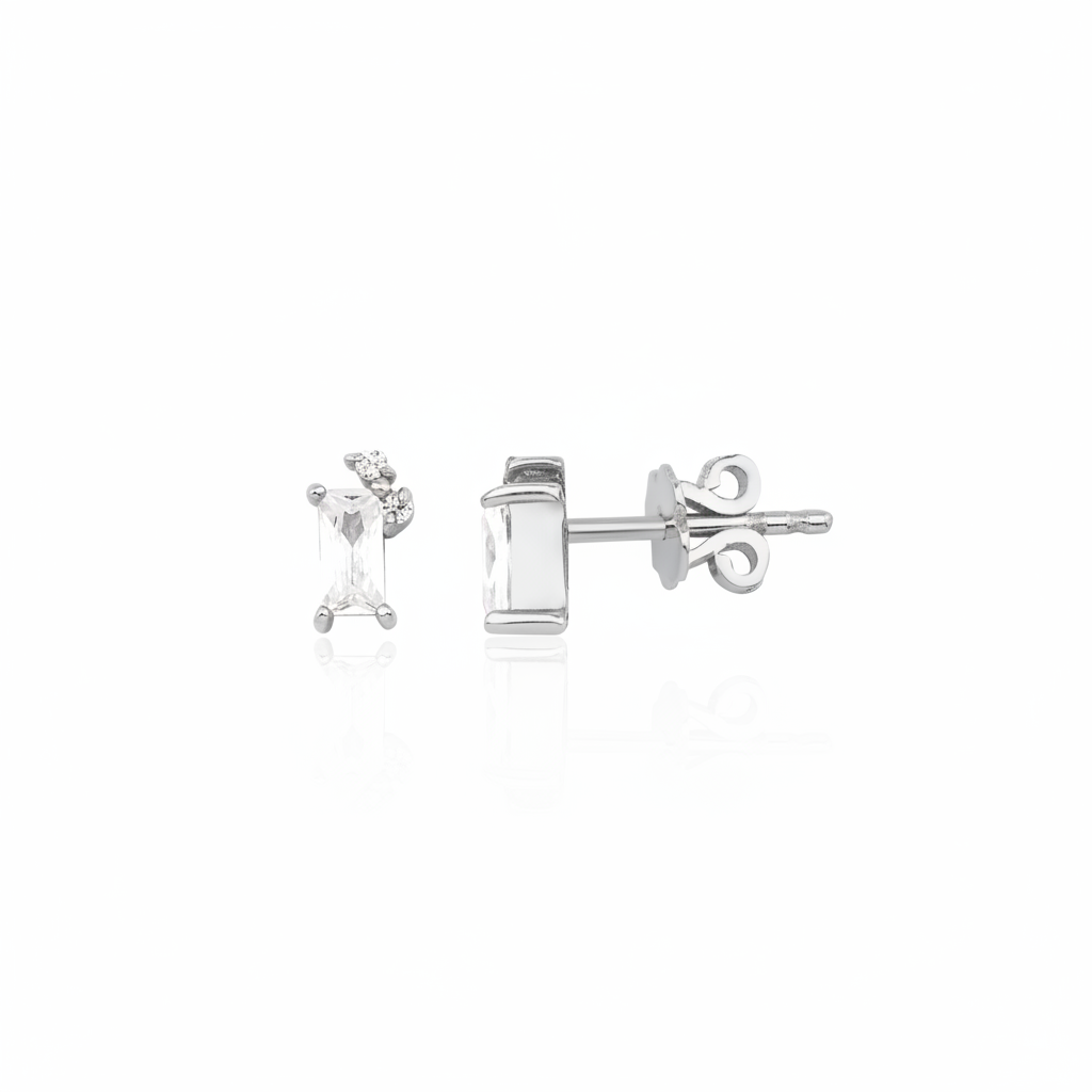 white gold baguette stud earrings with accent cluster on white background