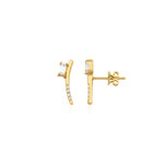 yellow gold curved baguette stud earrings on white background