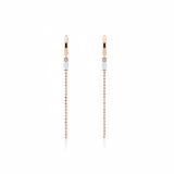rose gold huggie hoop earrings with baguette stone and beaded chain drop on white background