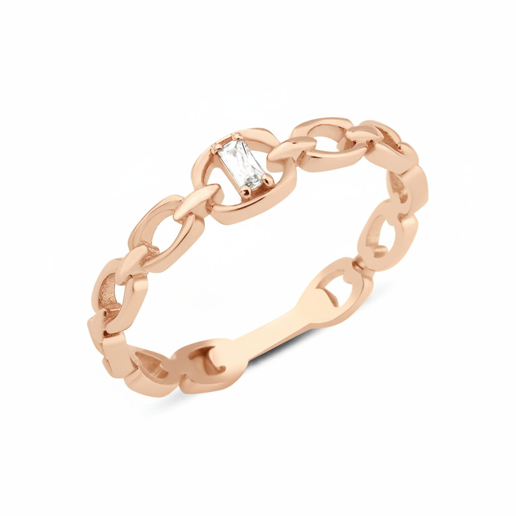 rose gold chain-link ring with baguette stone on white background