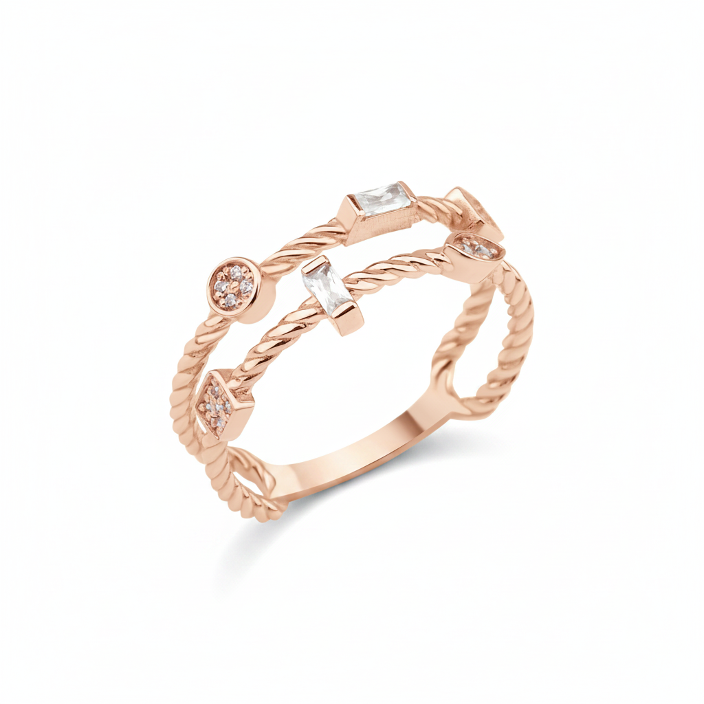 rose gold twisted double-band ring with baguette stones on white background