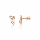 rose gold wing stud earrings with pave stones on white background