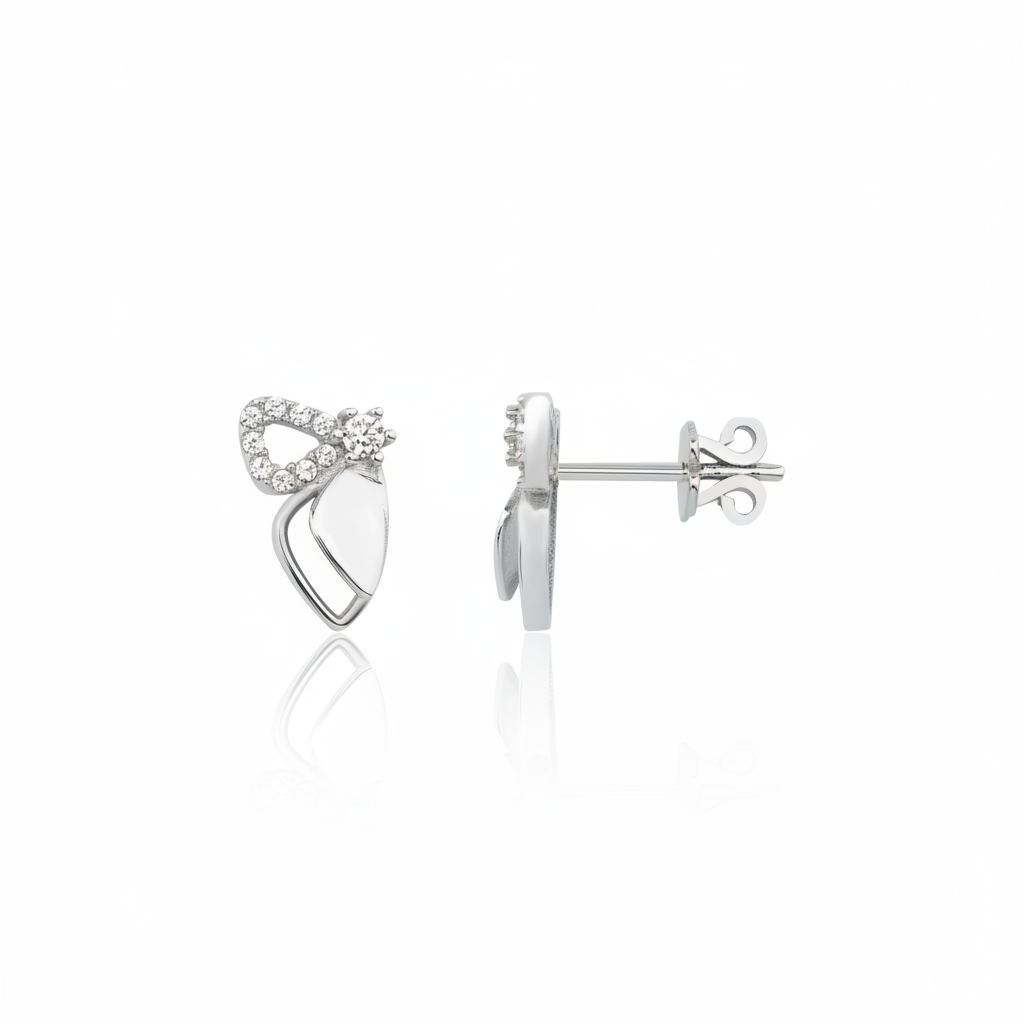 white gold wing stud earrings with pave stones on white background