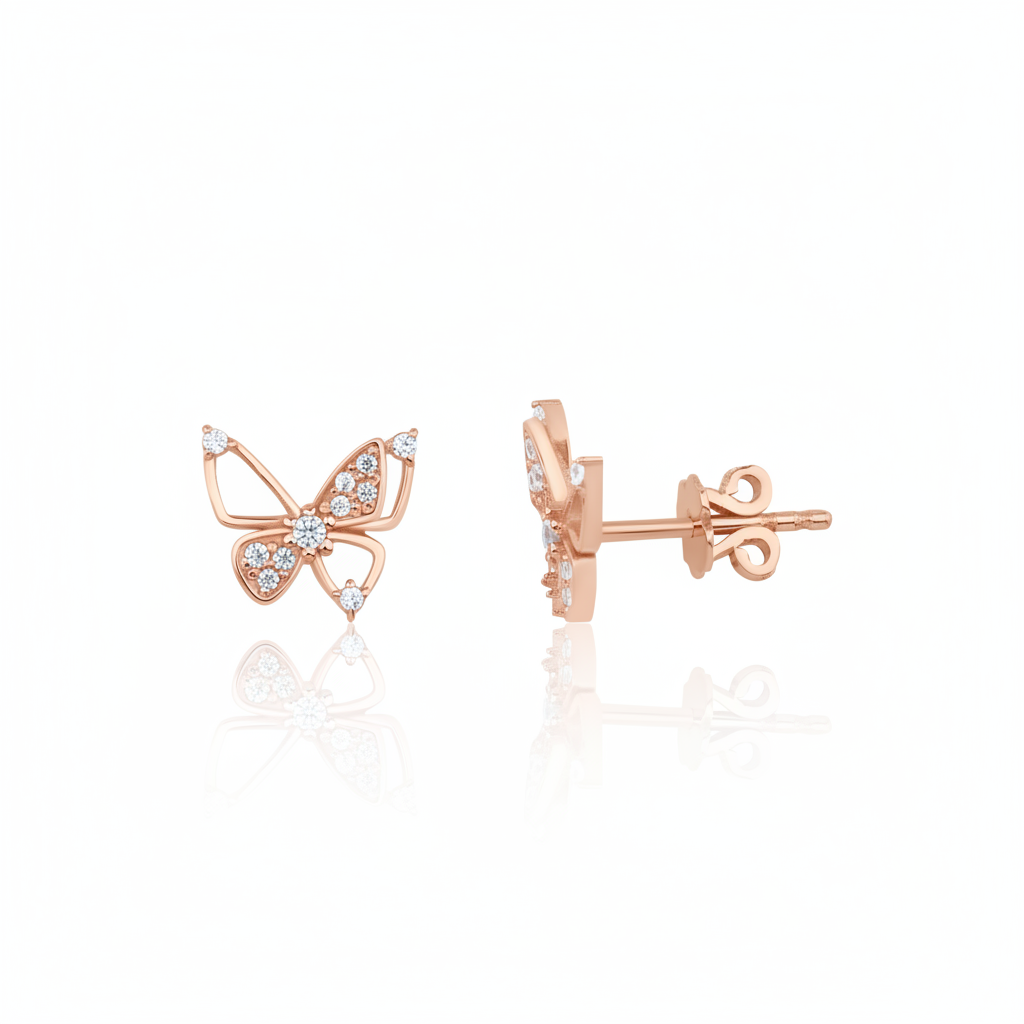 rose gold butterfly stud earrings with pave clusters on white background