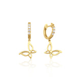 yellow gold hoop earrings with butterfly charms on white background
