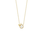 yellow gold bow halo pendant necklace on white background