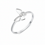 white gold butterfly ring with a center clear stone on a white background