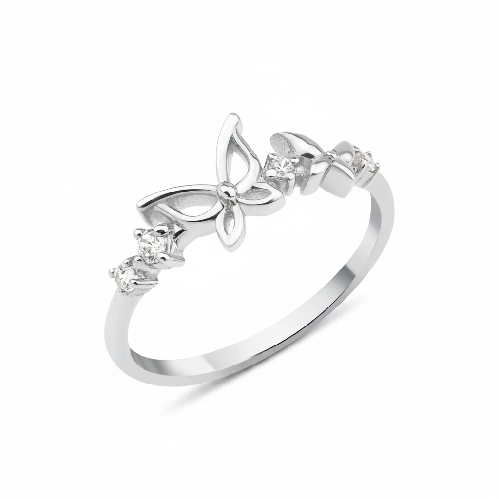 white gold openwork butterfly band ring on a white background