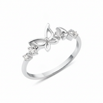 white gold openwork butterfly band ring on a white background