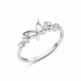 white gold openwork butterfly band ring on a white background