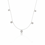 white gold teardrop station necklace on white background