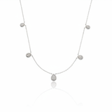 white gold teardrop station necklace on white background