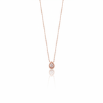 rose gold small teardrop pendant necklace on white background