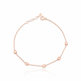 rose gold faceted nugget station bracelet on a white background