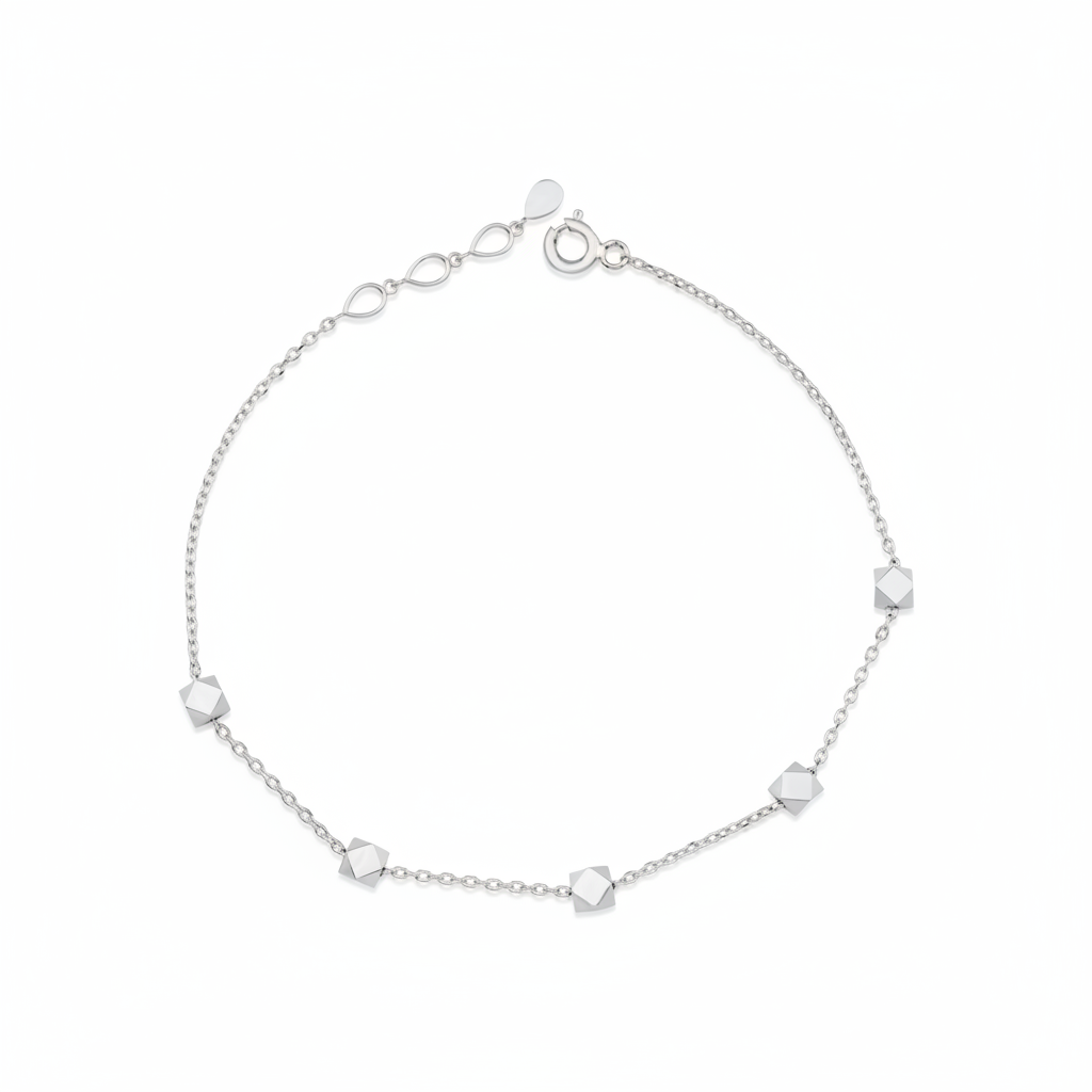 white gold faceted nugget station bracelet on a white background