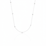 white gold faceted nugget station necklace on a white background