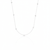 white gold faceted nugget station necklace on a white background