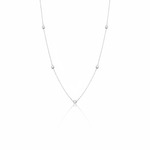 white gold faceted nugget station necklace on a white background