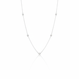 white gold faceted nugget station necklace on a white background