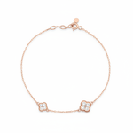 rose gold clover charm bracelet with White CZ stones on white background
