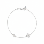 white gold clover charm bracelet with White CZ stones on white background