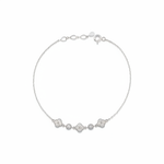 white gold clover and round link station bracelet with White CZ stones on white background