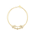 yellow gold double-strand clover bracelet with White CZ stones on white background