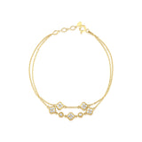 yellow gold double-strand clover bracelet with White CZ stones on white background