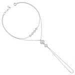 white gold hand chain bracelet with bezel-set stones and a floral motif drop on white background