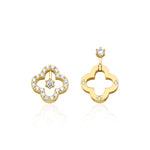 yellow gold asymmetric clover earrings on white background