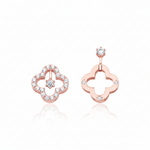 rose gold asymmetric clover earrings on white background