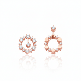 rose gold asymmetric halo earrings with White CZ stones on white background