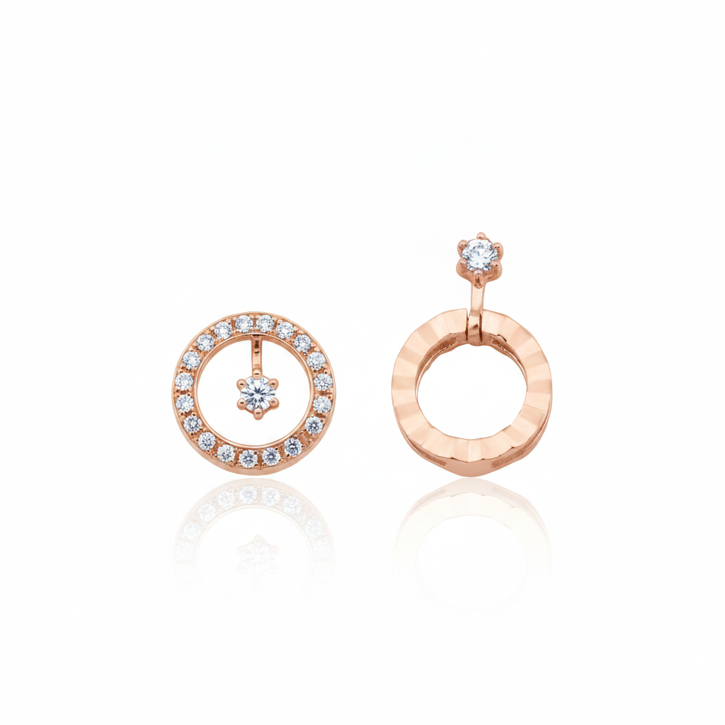 Rose gold asymmetric circle earrings with White CZ stones on white background