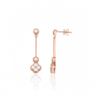 Rose gold quatrefoil drop earrings with White CZ stones on white background