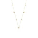 Yellow gold clover station necklace with White CZ stones on white background