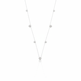 White gold clover station necklace with White CZ stones on white background