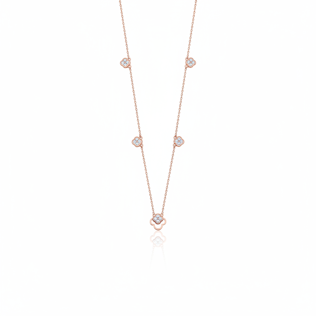Rose gold clover outline necklace with White CZ stones on white background