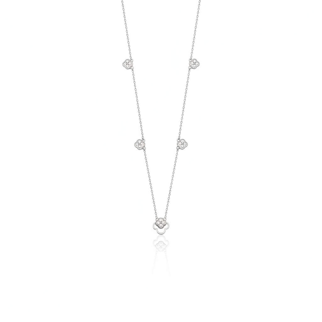 White gold clover outline necklace with White CZ stones on white background