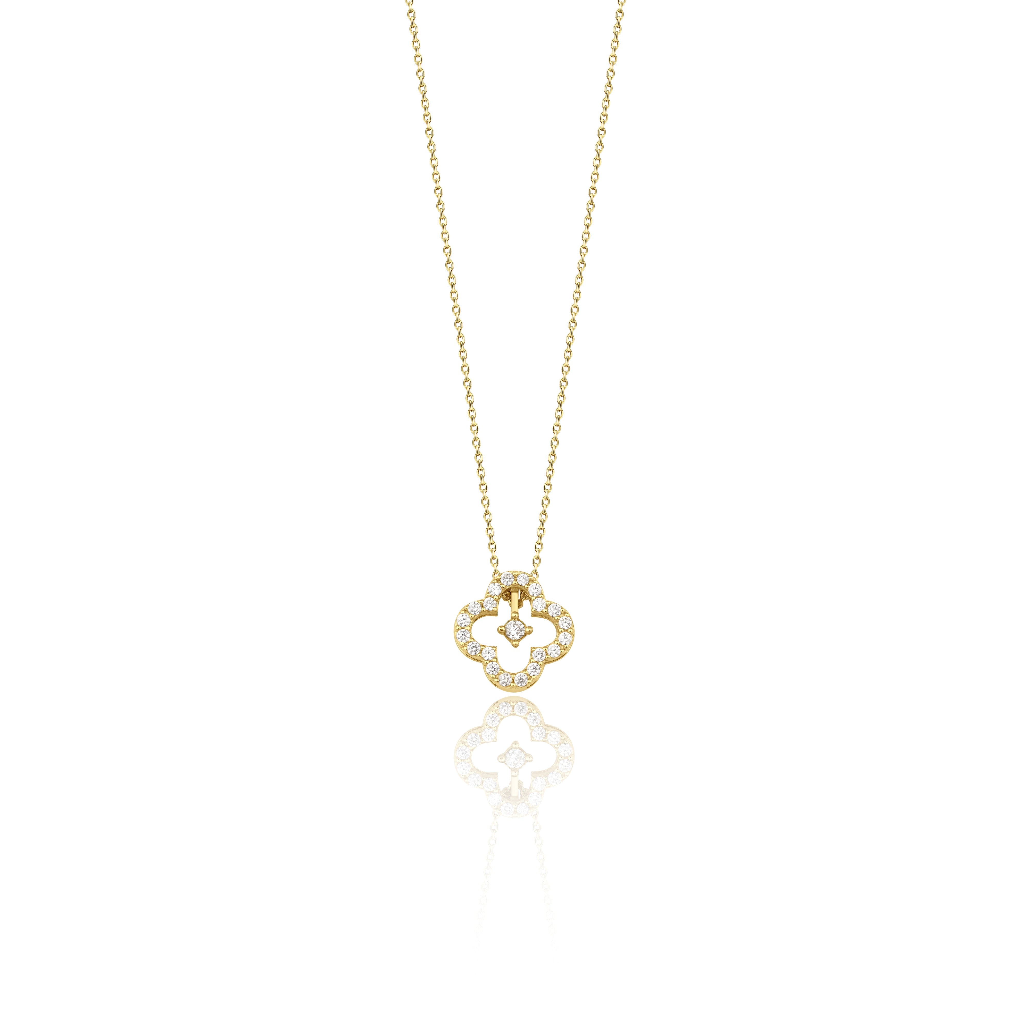 Yellow gold open clover silhouette necklace with White CZ stones on white background