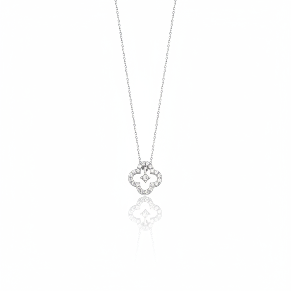 White gold open clover silhouette necklace with White CZ stones on white background