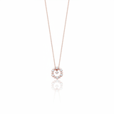 Rose gold circle pendant necklace with White CZ stones on white background