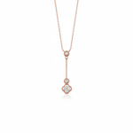 Rose gold vertical clover drop necklace with White CZ stones on white background