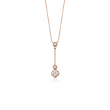Rose gold vertical clover drop necklace with White CZ stones on white background