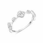 White gold clover band ring with White CZ stones on white background