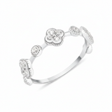 White gold clover band ring with White CZ stones on white background